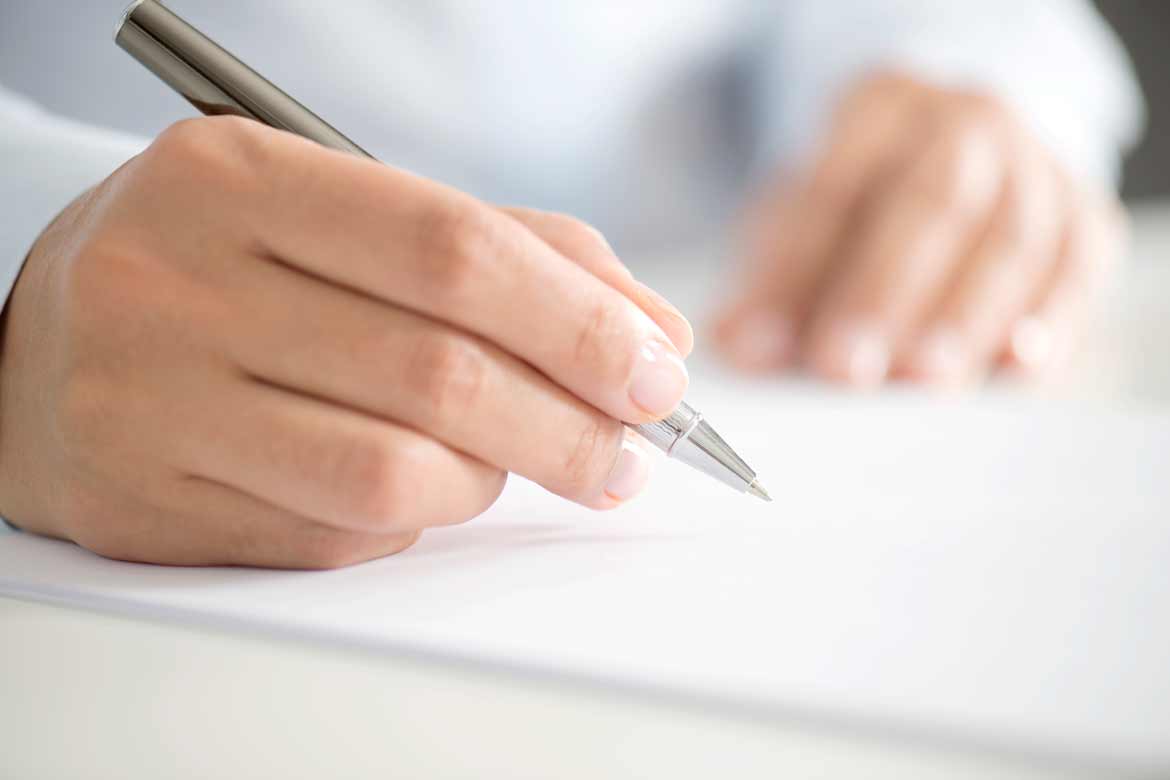 Woman Signing Contract Paper